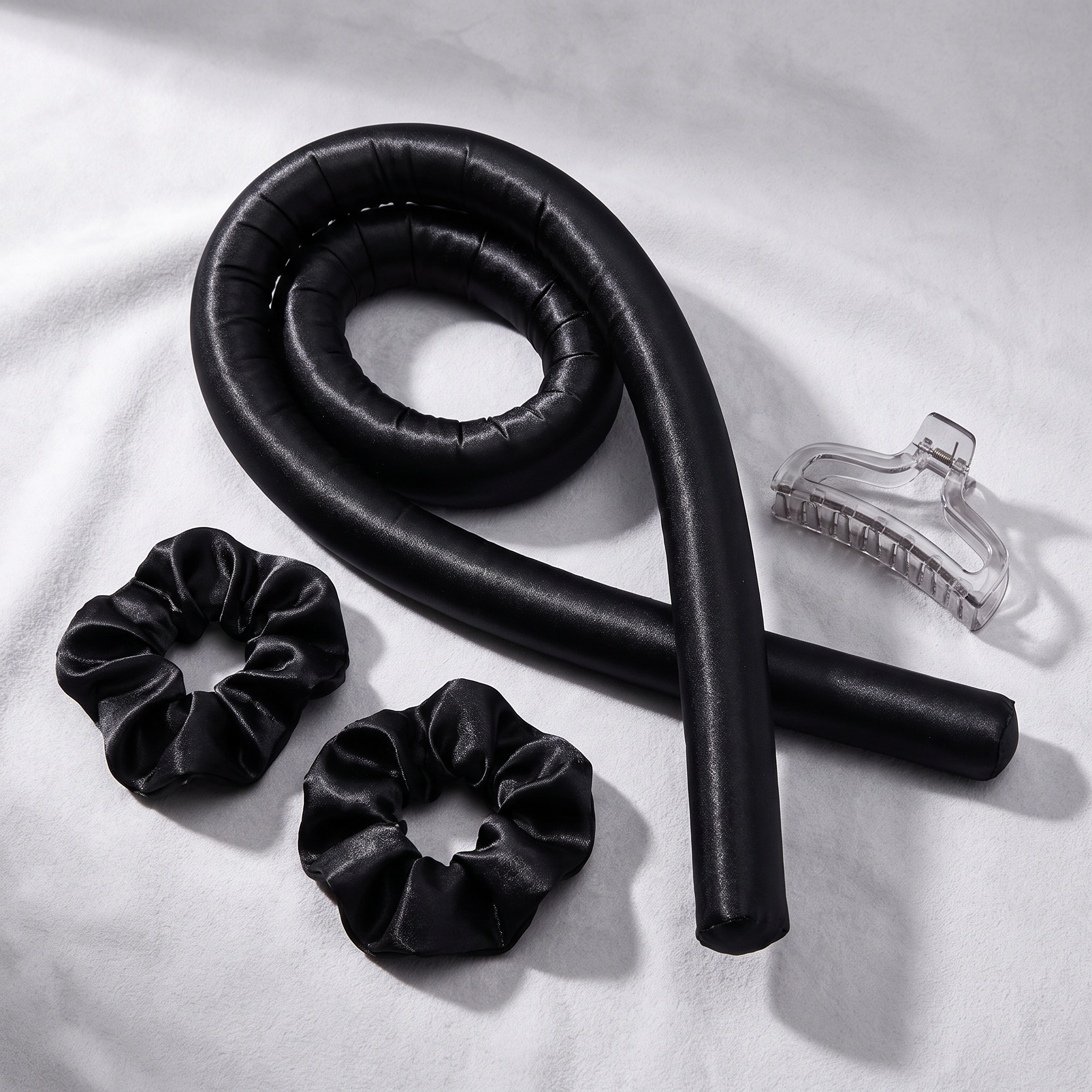Revonae heatless curling rod set in glossy black satin